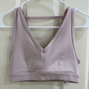 Pink ribbed Alo Yoga sports bra